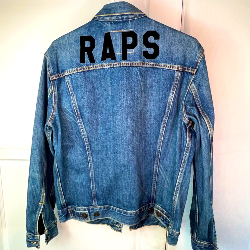 Levi’s denim jacket w RAPS on the back.